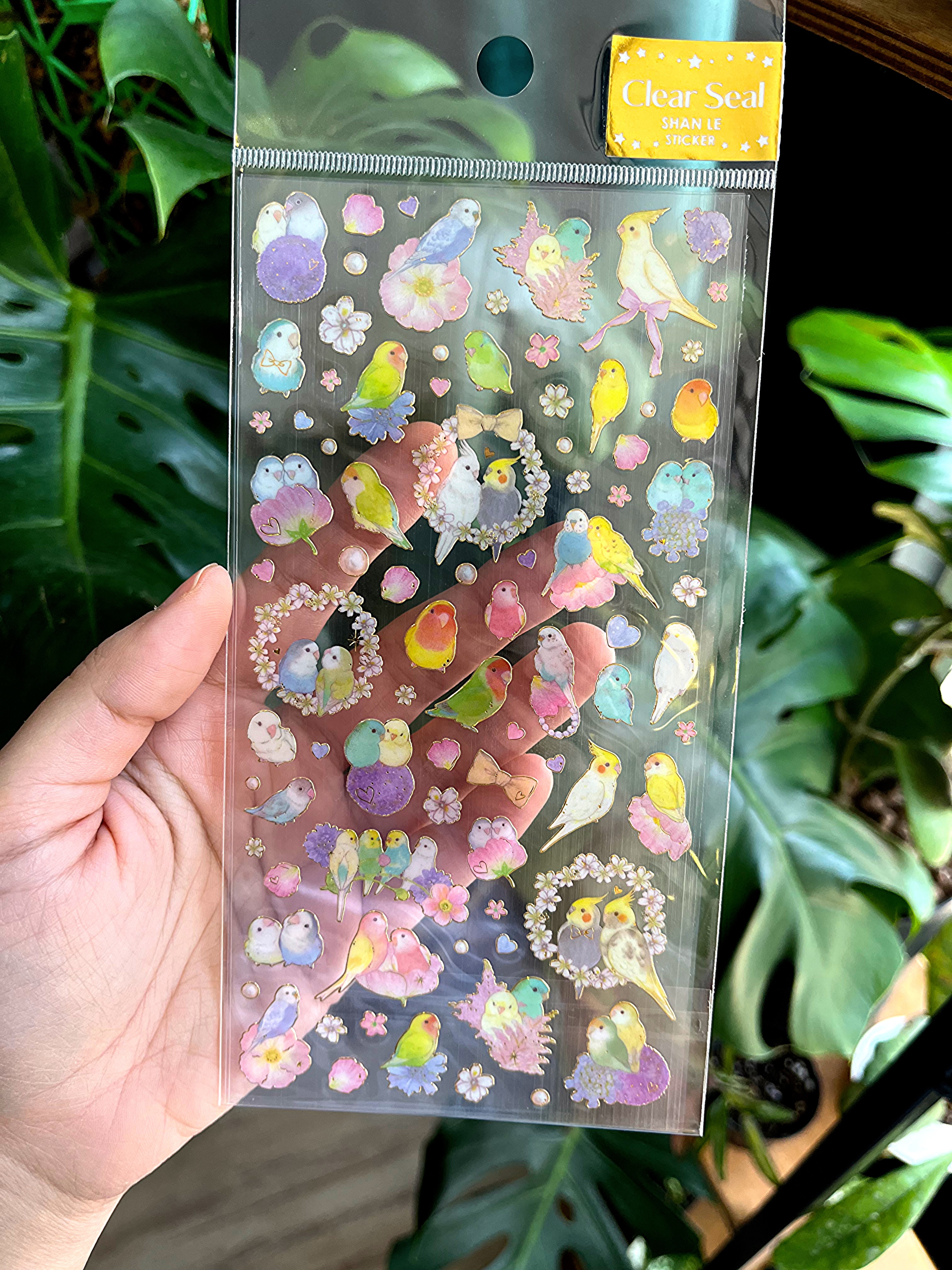 استیکر دور طلایی طرح عروس هلندی و مرغ عشق